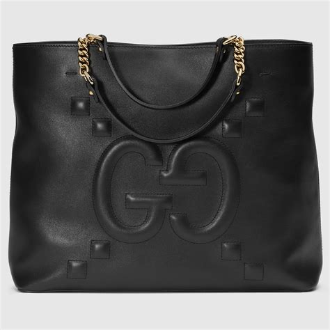 gucci gg embossed shoulder bag|Gucci embossed leather tote bag.